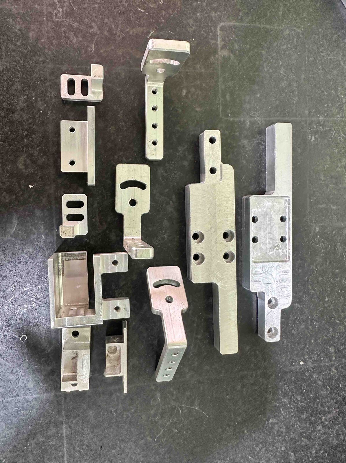 Precision machined aluminium brackets and arms