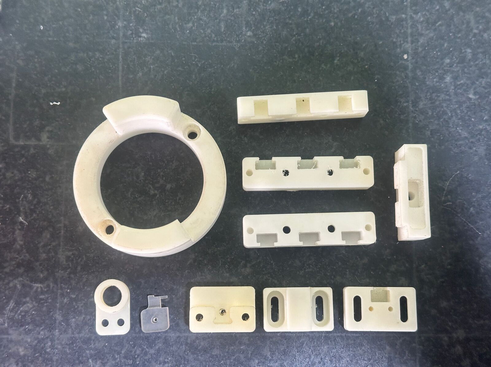Machined guide rings and wear pads