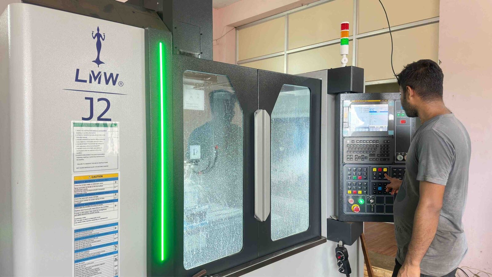 LMW J2 machining centre with operator at the control